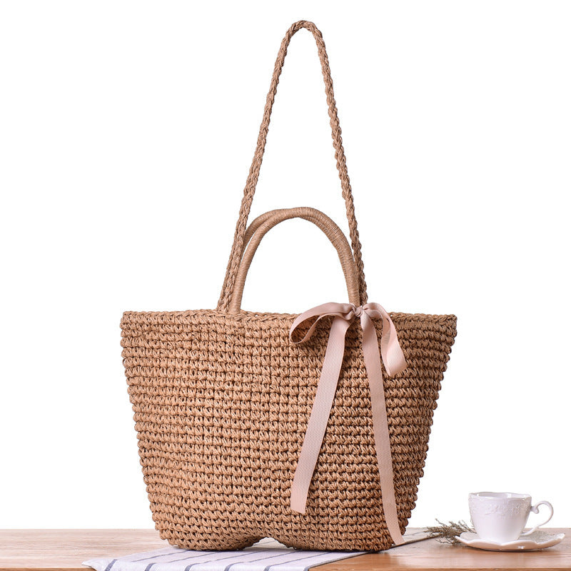 Bolso bandolera de playa redondo de paja tejida