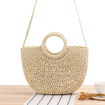 Bolso bandolera de playa redondo de paja tejida