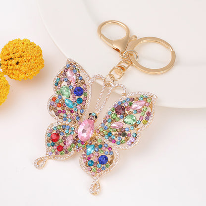 Llavero pequeño con forma de mariposa y diamantes de imitación de metal