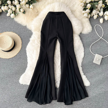 Pantalones acampanados de malla con costuras irregulares para mujer