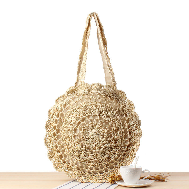 Bolso bandolera de playa redondo de paja tejida