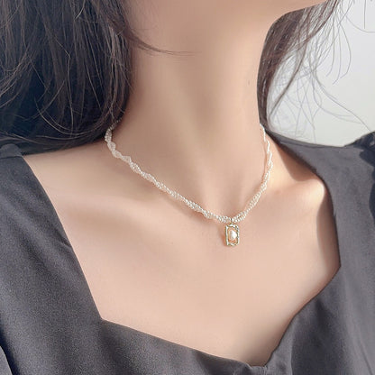 Collar de moda de lujo con entrada de temperamento de clavícula con cuentas pequeñas en forma de arroz de doble capa de nicho
