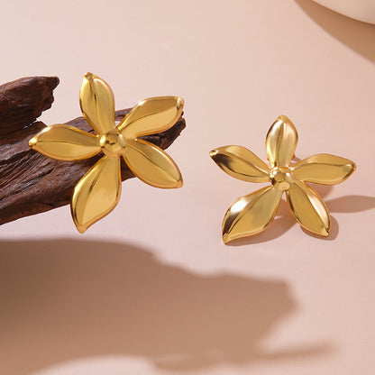 Pendientes de acero de titanio con perlas y flores de dulce personalidad