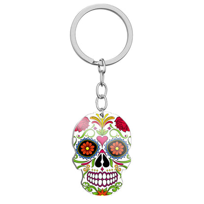 Llavero de acero inoxidable con estampado a color de calavera del Día de los Muertos