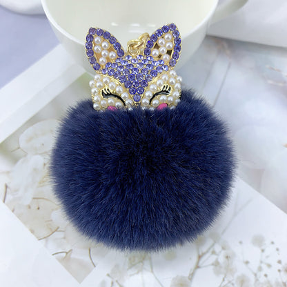 Llavero con colgante de bola de pelo de zorro con diamantes de imitación y perlas de aleación
