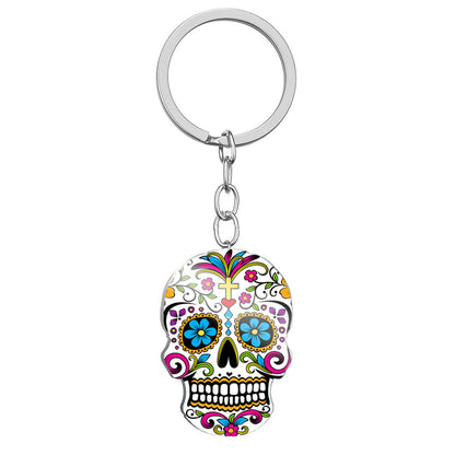 Llavero de acero inoxidable con estampado a color de calavera del Día de los Muertos