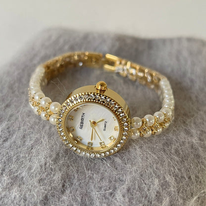 Reloj de mujer exquisito con correa de acero dorado de alta calidad