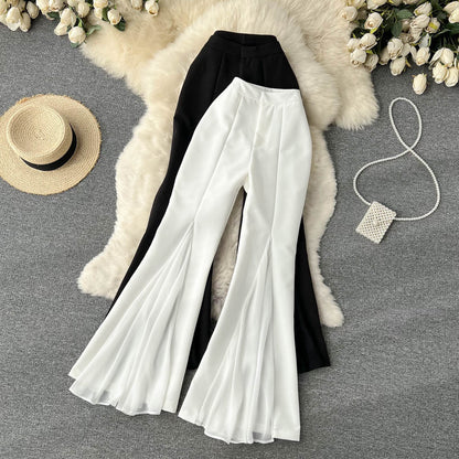 Pantalones acampanados de malla con costuras irregulares para mujer