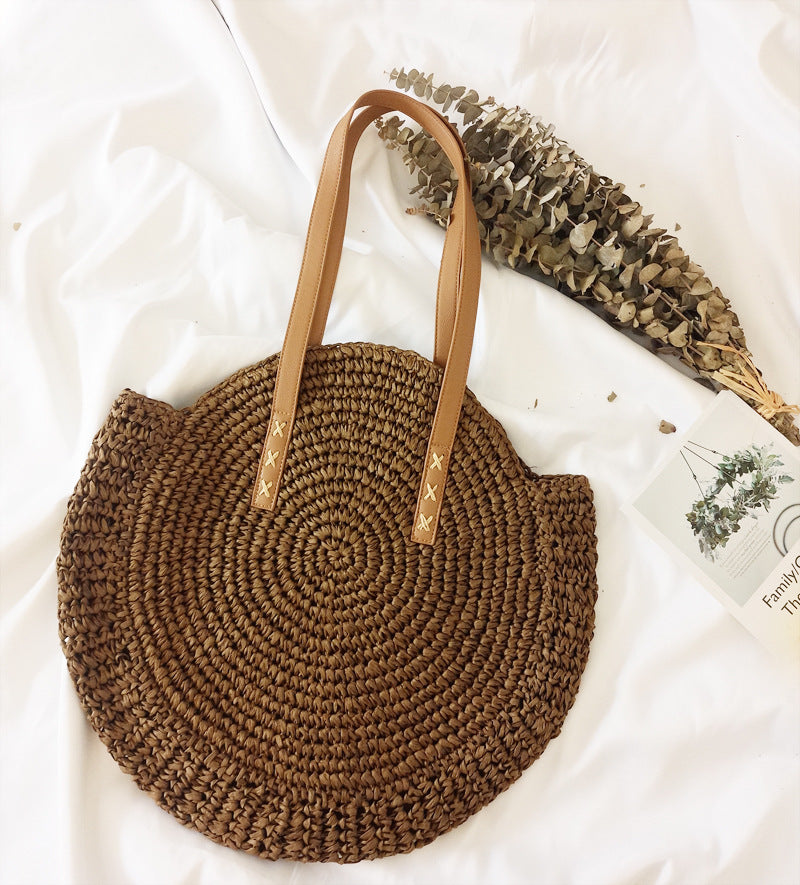 Bolso bandolera de playa redondo de paja tejida
