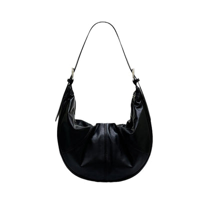 Bolso de hombro con textura de piel de vaca