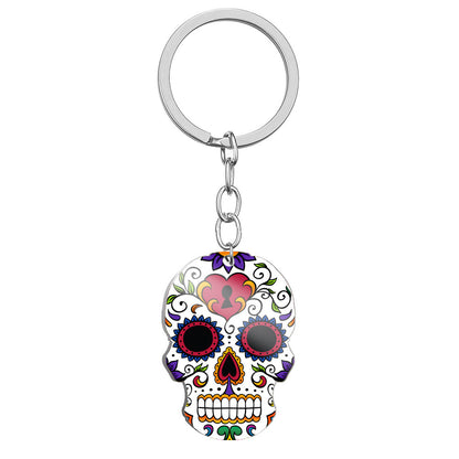 Llavero de acero inoxidable con estampado a color de calavera del Día de los Muertos