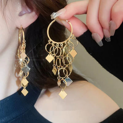 Damen-Ohrringe mit Diamanten und Quasten