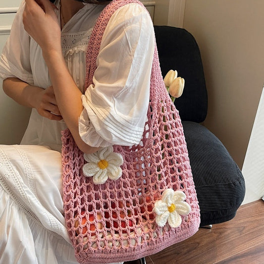 Bolso de punto con malla tejida y flores