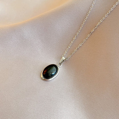 Collar de acero de titanio con colgante de ojo de gato ovalado Diseño de interés especial
