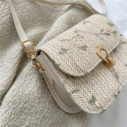 Bolso de sillín tejido con encaje floral