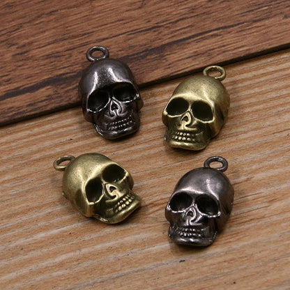 10 colgantes de cabeza de fantasma de calavera de 3 colores para Halloween