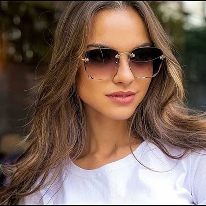Randlose quadratische Sonnenbrille für Damen