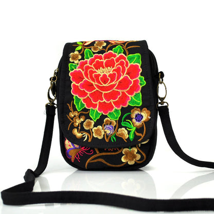 Flip-Tasche mit Stickerei im Ethno-Stil