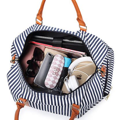 Bolso grande de lona y cuero