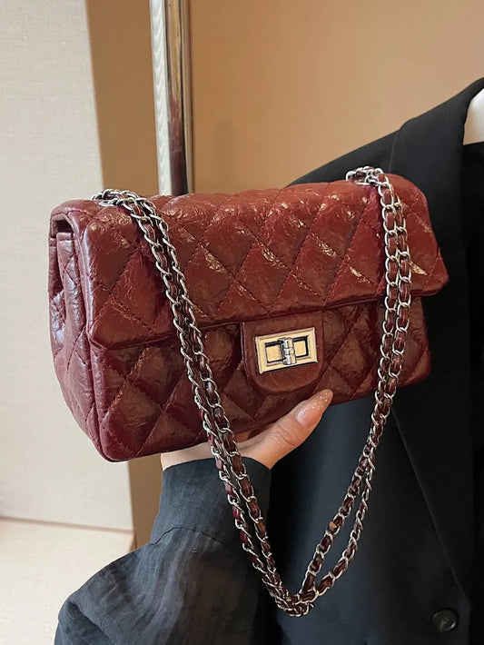 Twist Charm Shoulder Bag