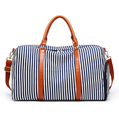 Bolso grande de lona y cuero
