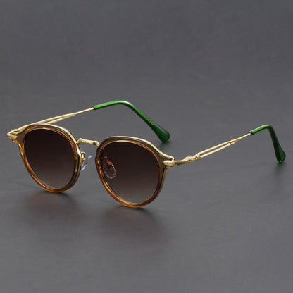 Gafas de sol con montura circular de metal y protección UV para hombres y mujeres.