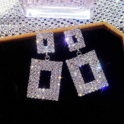 Pendientes de diamantes de imitación con borlas de flores y mariposas