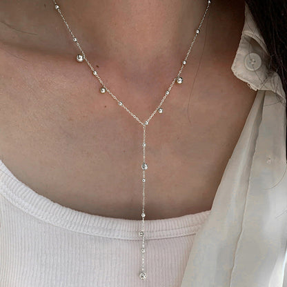 Collar largo con borlas y gorro de plata de ley S925
