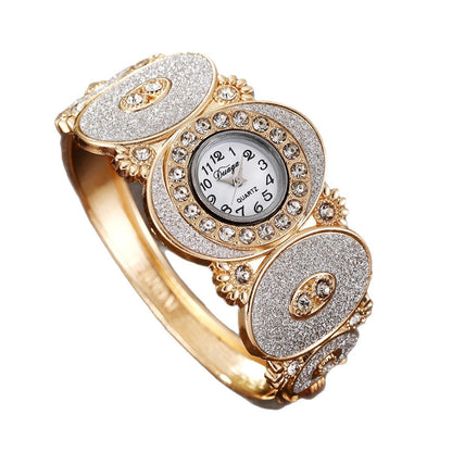 Reloj de cuarzo para mujer con diseño de flor y hoja de diamante ovalado