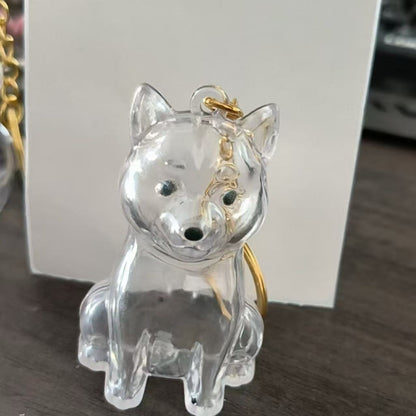 Lindo llavero colgante con forma de perro para guardar pelo