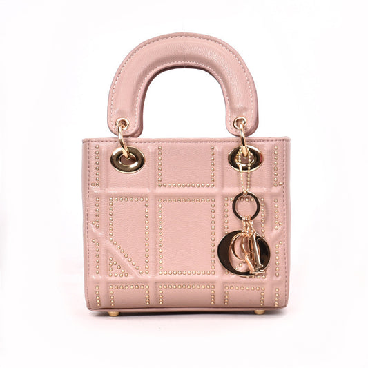 Bolso cuadrado pequeño con remaches Dai Fei