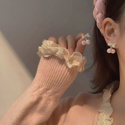 Pendientes de lazo con perla y corazón para mujer