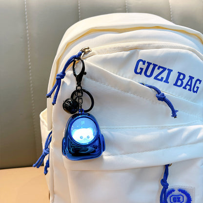 Llavero con colgante de bolso de oso luminoso