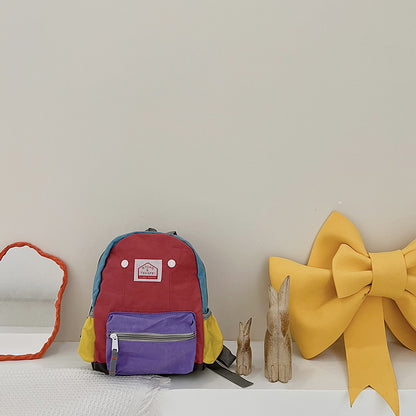 Mochila de lona ligera y sencilla para niños y niñas con protección para la columna vertebral.