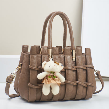 Bolso de hombro tejido a mano