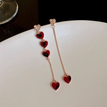 Silver Needle Asymmetrische Love Chain Ohrringe mit Diamanten