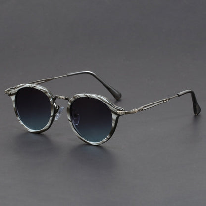 Gafas de sol con montura circular de metal y protección UV para hombres y mujeres.
