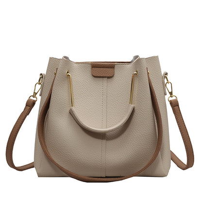 Bolso tipo cubo con textura a juego para otoño