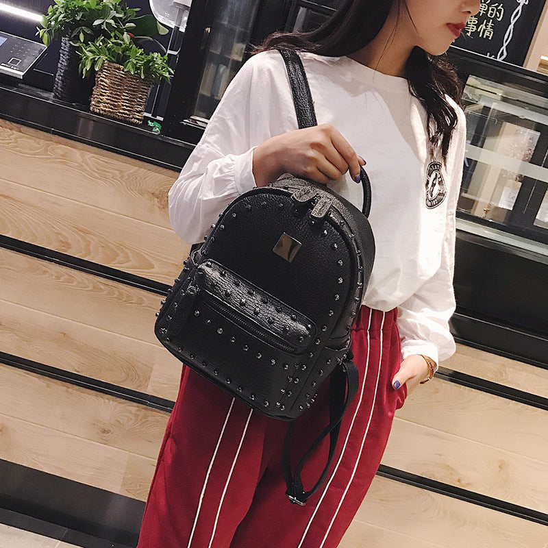 LuxeBolt Rivet Backpack