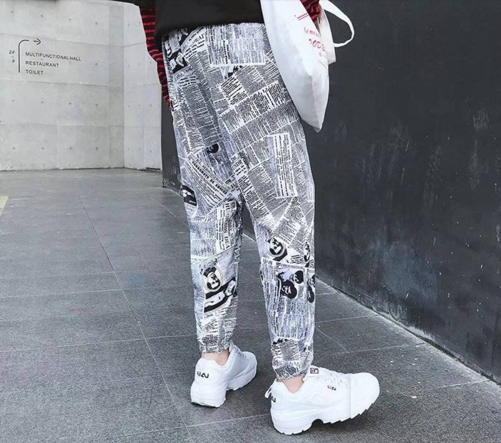 Tide brand hip hop newspaper pants men and women pants ins the same paragraph street loose beam pants national tide - BAGMODA