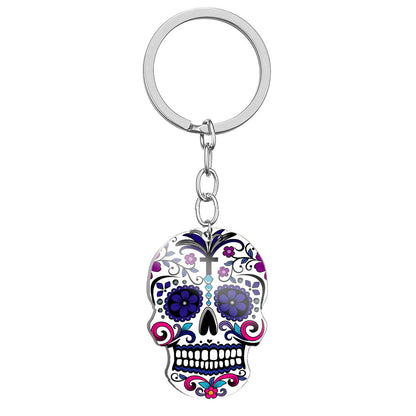 Llavero de acero inoxidable con estampado a color de calavera del Día de los Muertos
