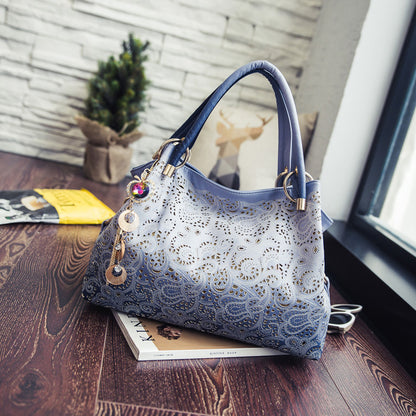 Bolso de hombro con estampado de pavo real hueco