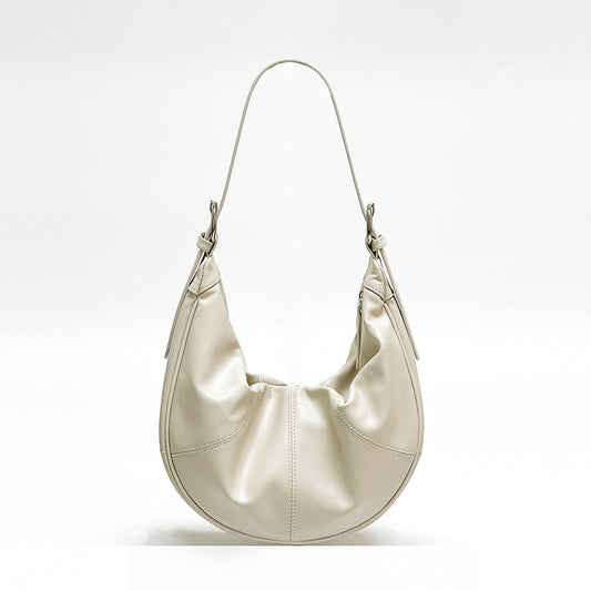 Schultertasche mit Rindslederstruktur