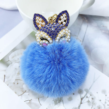 Llavero con colgante de bola de pelo de zorro con diamantes de imitación y perlas de aleación