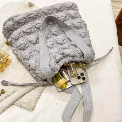 Bolsa de mano con cordón