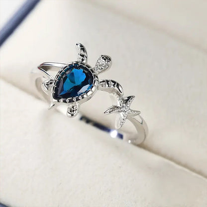 Anillo con diseño de animales lindos del océano, viento hawaiano, vacaciones en la playa