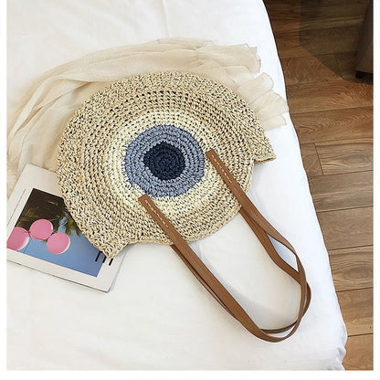 Bolso bandolera de playa redondo de paja tejida