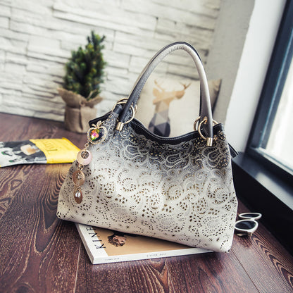 Bolso de hombro con estampado de pavo real hueco