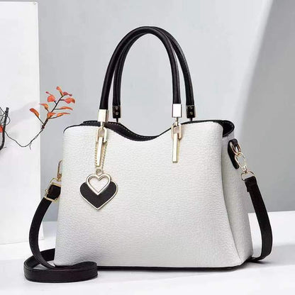 Bolso bandolera con estampado de Litchi Bay