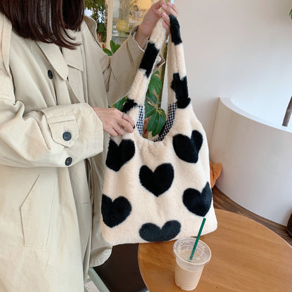 Bolso de hombro de peluche con forma de corazón